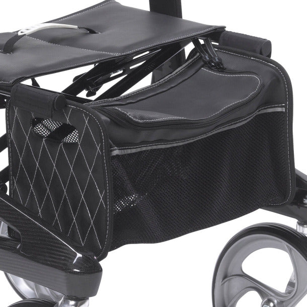 Nitro Elite Carbon Fiber Rollator by Drive Medical|Nitro Elite Carbon Fiber Rollator by Drive Medical with user|Closeup on Carbon Fiber on the Nitro Elite Rollator|Ample storage in the Nitro Elite Carbon Fiber Rollator|Easy to access hand brakes|Large, sleek wheels make the rollator look more modern|Nitro Elite Carbon Fiber Rollator by Drive Medical folds easily