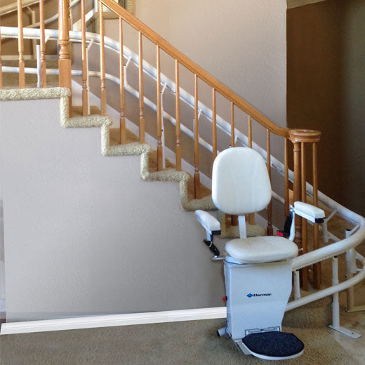 Helix Stair lift is custom made |Stair lift is custom fit to your unique staircase|Plush seat with flip up arms and wide, non-slip footrest|Great for spiral, 90 degree, or 180 degree staircases|Add accessibility to several flights of stairs with the Helix|Several finishes are available for the smooth glide rail|Seat easily folds to create more space on stairways|Curved stair lift can be used indoor or outdoor|Seat folds tight and compact|