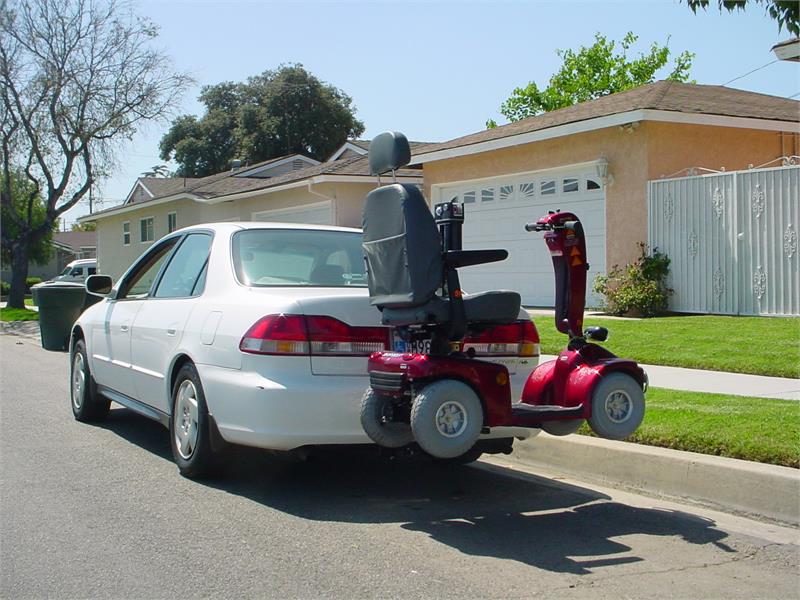 TriLift Heavy Duty Mobility Carrier can even be used on small cars!