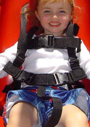 HARNESS - Replacement Harness for Jennswing, made of woven water resistant polypropylene with plastic side release buckles. Fully adjustable harness.|JennSwing, partially reclined, body-embracing design and easily adjustable safety harness, the Jennswing offers children a safe and comfortable fun ride.