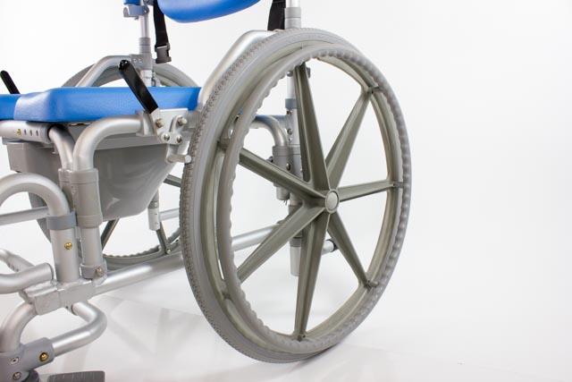 MaxiBathe Bariatric Self-Propelled Shower Chair by Platinum Health|Commode pail comes standard|Commode pail is easy to remove|Calf strap and footrests keep users comfortable while sitting|Footrests flip up so standing is easier and safer for users|Large self-propelling wheels