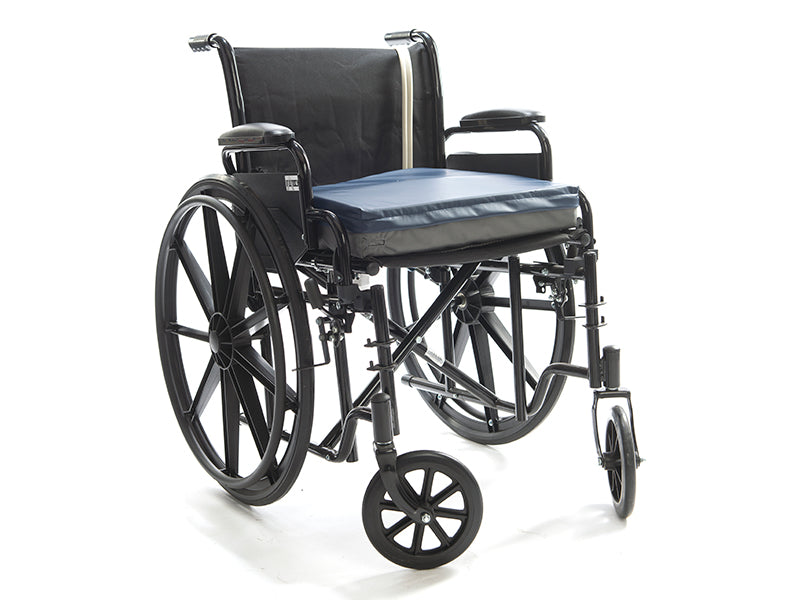 Protekt Alternating Pressure Seat Relief Cushion by Proactive Medical|Alternating air pressure cushion pictured on chair|Pump on Wheelchair Back|Cushion and Pump|Pump Functions|Non-slip bottom allows cushion to stay in place on wheelchair seats|4 Alternating air bladders provide continuous air pressure|Visco Polymer Memory Foam top layer is comfortable and reduces pressure|Foam is soft and contours each individual user|Package Contents|Plug