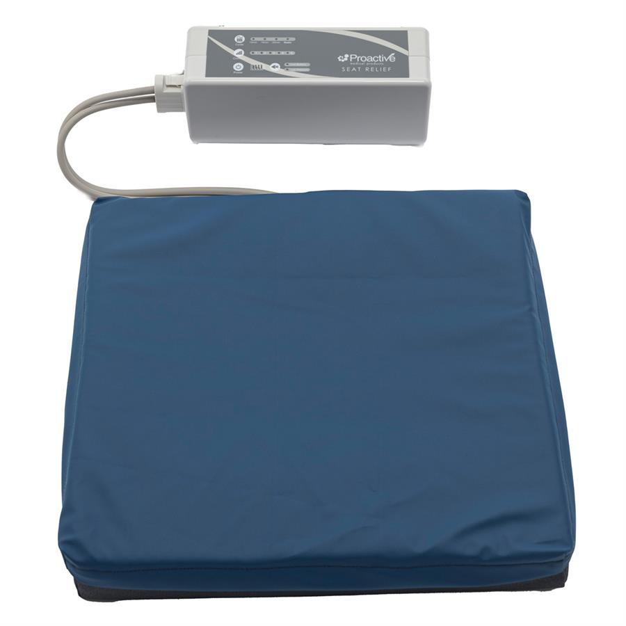 Protekt Alternating Pressure Seat Relief Cushion by Proactive Medical|Alternating air pressure cushion pictured on chair|Pump on Wheelchair Back|Cushion and Pump|Pump Functions|Non-slip bottom allows cushion to stay in place on wheelchair seats|4 Alternating air bladders provide continuous air pressure|Visco Polymer Memory Foam top layer is comfortable and reduces pressure|Foam is soft and contours each individual user|Package Contents|Plug