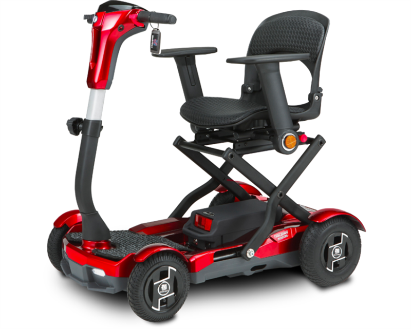 TeQno Folding Scooter by EV Rider in Gold Metallic|TeQno Folding Scooter by EV Rider in Metallic Red|Back view of the TeQno with reflective stickers to protect users at night|The TeQno folds to a compact size|If you do not fold the scooter, the seat folds for more compact storage|Scooter can be stored upright for more room in closets or trunks|Optional Electric Horn with 3 sounds|Optional deluxe cup holder