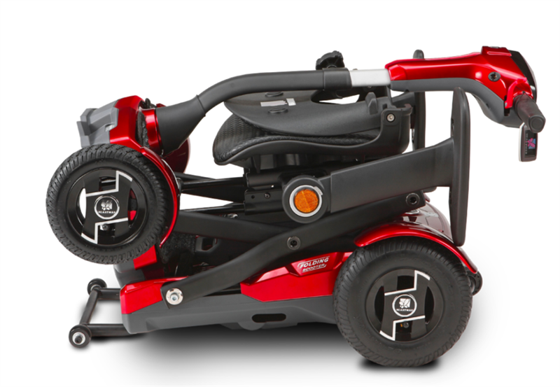 TeQno Folding Scooter by EV Rider in Gold Metallic|TeQno Folding Scooter by EV Rider in Metallic Red|Back view of the TeQno with reflective stickers to protect users at night|The TeQno folds to a compact size|If you do not fold the scooter, the seat folds for more compact storage|Scooter can be stored upright for more room in closets or trunks|Optional Electric Horn with 3 sounds|Optional deluxe cup holder