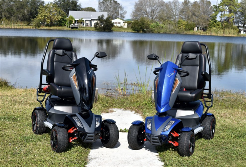 EV Rider Vita Monster Scooter |EV Rider Vita Monster Scooter|EV Rider Vita Monster Scooter adjustable tiller|Vita Monster all-terrain scooter with comfortable captains' chair supports up to 350 lbs.|Vita Monster with double a-arm front suspension|Blue Sapphire Vita Monster|EV Rider Vita Monster Scooter|Blue Sapphire Vita Monster|Optional Electric Horn with 3 sounds|Optional deluxe cup holder|Optional Safety Flag|EV Rider Vita Monster Scooter