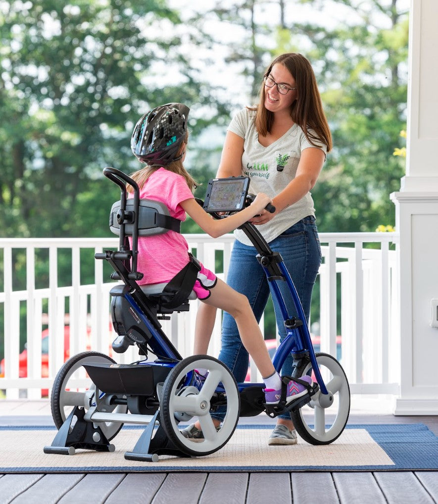 Rifton Large Adaptive Tricycle|Adaptive Tricycle by Rifton - Large (Blue)Blue large tricycle with optional trunk support, headrest & hand brake|Large Rifton Tricycle User & Item Dimensions|Rifton Tricycle Disassembly Step 3|Rifton Tricycle - Pelvic Harness, Optional|Rifton Tricycle Front Storage Basket, Optional|Rifton Tricycle Front Guide Bar, Optional|Rifton Tricycle Front Handbrake In-Use|Rifton Tricycle Pedal Raise Kit, Optional|||||