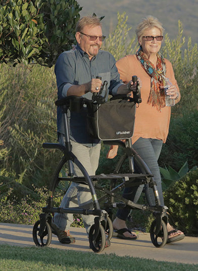 UPWalker|UPWalker Mobility Stand Up Walking Aid by LifeWalker|UPWalker - Fabric Seat|UPWalker - Brakes|UPWalker - Wheels|UPWalker - Folding Design|UPWalker - Sit to Stand Armrests|UPWalker Mobility Stand Up Walking Aid by LifeWalker|Optional Shopping Bag|Optional Smart Phone Holder|Optional Flashlight|Optional Personal Bag|Optional Cane Holder|Optional Back Support|Optional Cup Holder