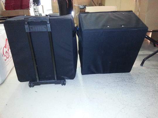 Optional - carry case, front and back view with retractable handles