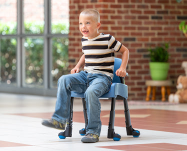 Rifton Compass Chair|The unique features of the compass chair makes it secure and comfortable|Available in 5 sizes for children and adults|Rifton Compass Chair Shown with Optional Dynamic Feet|Adjustable front and rear legs|Optional Seat Belt easily attaches to the Compass Chair seat|Standard Legs|Low-Friction Legs|Optional Dynamic Feet|Optional Stability Feet|Optional Seat Belt|Optional Pelvic Support|Optional Rocking Base