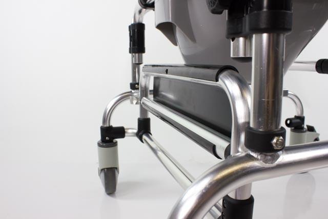 Caspian Mobile Shower Chair by Platinum Health|Armrests lift up for ease of transfers|Footrest flips up for added comfort and convenience|Commode pail comes standard|Lift-up arms make transfers easy|Height adjustable frame|Folding Footrests standing access to the chair|Diagram and measurements for Caspian Mobile Shower Chair