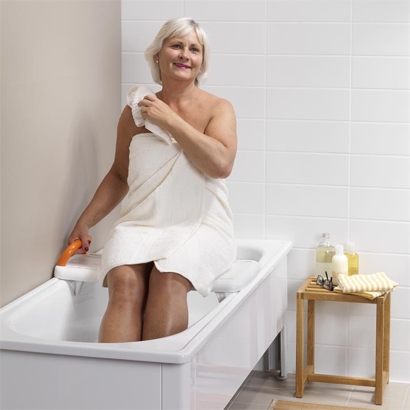 Etac Fresh Bath Board is available without the orange safety handle|Etac Fresh Bath Board with optional safety handle|Etac Fresh Bath Board Step One|Etac Fresh Bath Board in use|Etac Fresh Bath Board Step Two|Etac Fresh Bath Board Step Three