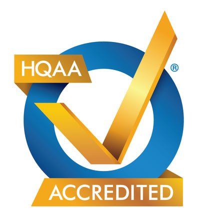 HQAA Accredited logo featuring a large blue circle with a gold checkmark and the words 'HQAA ACCREDITED' in white text on gold banners, on a white background.
