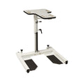 HCI Hydraulic UBE Table|Adjustable Arm adjusts height from 27"-37 and hydraulic pump|Turn knob allows user to lock casters in place to keep table more sturdy|Height adjustment allows for a variety of users to enjoy use of table|User with the HCI Hydraulic UBE Table and the Monark Ergometer
