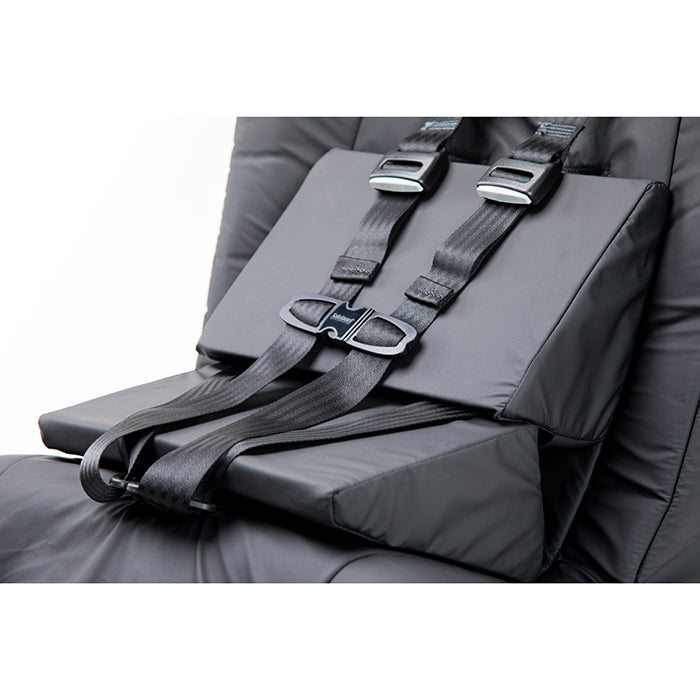 Inspired By Drive Spirit Spica Car Seat with Positioning Wedges|Side view of Spica car seat without positioning wedges|Inspired By Drive Spirit Spica Car Seat without Positioning wedges|Closeup of two positioning wedges for Spica Car Seat by Inspired by Drive|Closeup of buckle closure for Spica Car Seat|Two memory foam positioning wedges come standard with Spica Car seat|Memory Foam padding throughout entire Spica Car Seat by Inspired By Drive