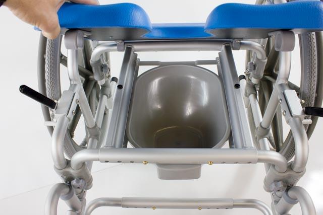 MaxiBathe Bariatric Self-Propelled Shower Chair by Platinum Health|Commode pail comes standard|Commode pail is easy to remove|Calf strap and footrests keep users comfortable while sitting|Footrests flip up so standing is easier and safer for users|Large self-propelling wheels
