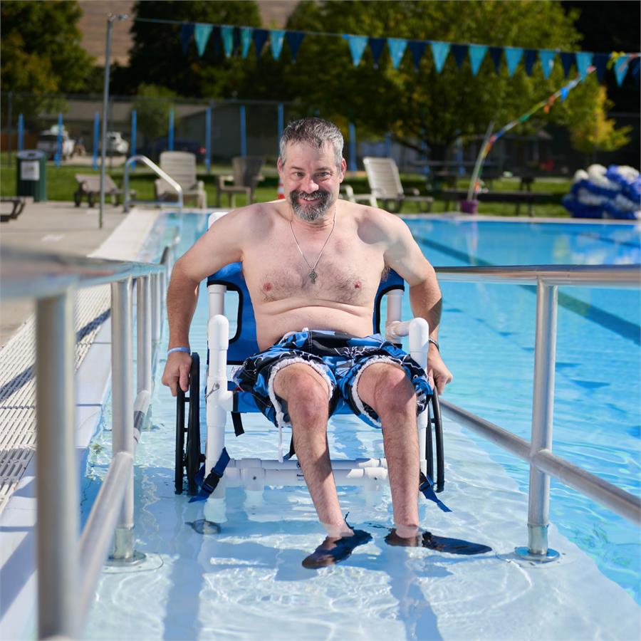 PVC Pool Access Chair with 3 sizes, use in pools, showers and locker rooms. |PVC Pool Access Chair working with zero entry pools or pools with ramps|PVC Pool Access Chair has adjustable height armrests||Optional Seat Belt with a velcro close