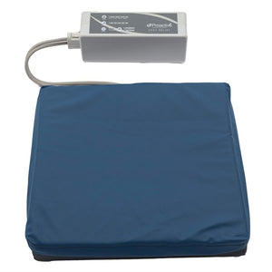 Protekt Alternating Pressure Seat Relief Cushion by Proactive Medical|Alternating air pressure cushion pictured on chair|Pump on Wheelchair Back|Cushion and Pump|Pump Functions|Non-slip bottom allows cushion to stay in place on wheelchair seats|4 Alternating air bladders provide continuous air pressure|Visco Polymer Memory Foam top layer is comfortable and reduces pressure|Foam is soft and contours each individual user|Package Contents|Plug