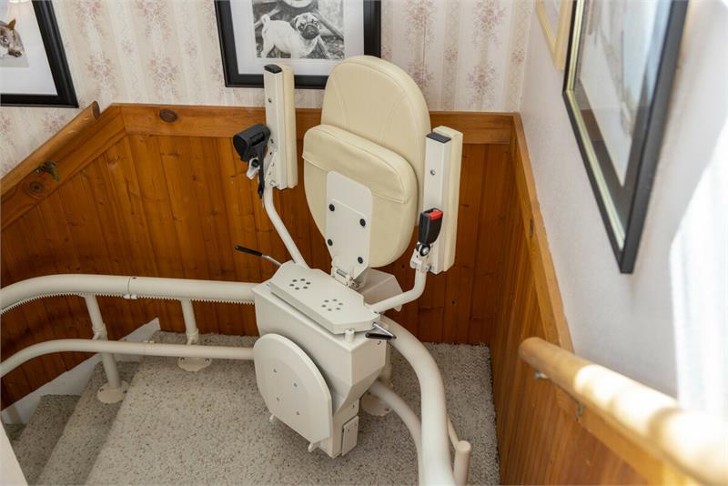 Helix Stair lift is custom made |Stair lift is custom fit to your unique staircase|Plush seat with flip up arms and wide, non-slip footrest|Great for spiral, 90 degree, or 180 degree staircases|Add accessibility to several flights of stairs with the Helix|Several finishes are available for the smooth glide rail|Seat easily folds to create more space on stairways|Curved stair lift can be used indoor or outdoor|Seat folds tight and compact|
