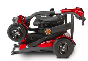 TeQno Folding Scooter by EV Rider in Gold Metallic|TeQno Folding Scooter by EV Rider in Metallic Red|Back view of the TeQno with reflective stickers to protect users at night|The TeQno folds to a compact size|If you do not fold the scooter, the seat folds for more compact storage|Scooter can be stored upright for more room in closets or trunks|Optional Electric Horn with 3 sounds|Optional deluxe cup holder