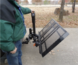 Easily flip the Auto Fold Up Electric Lift by EZ Carrier with button