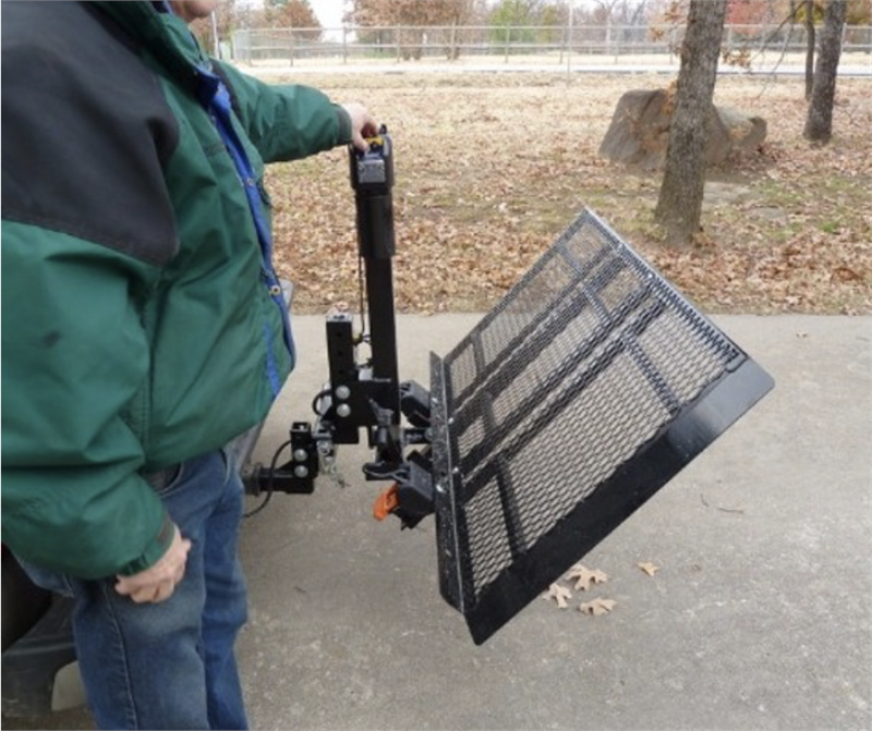 Easily flip the Auto Fold Up Electric Lift by EZ Carrier with button