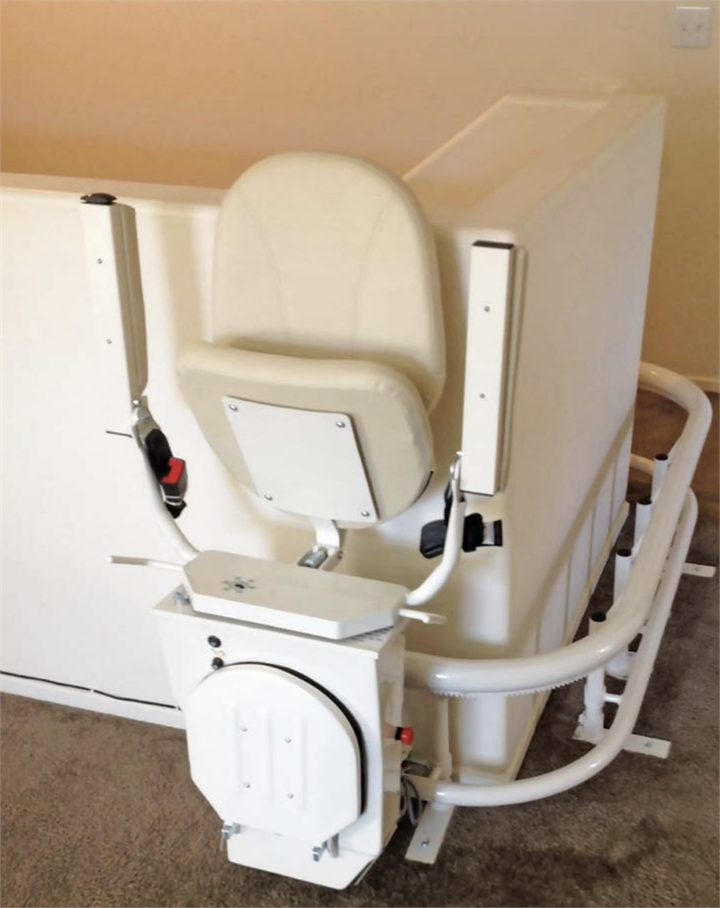 Helix Stair lift is custom made |Stair lift is custom fit to your unique staircase|Plush seat with flip up arms and wide, non-slip footrest|Great for spiral, 90 degree, or 180 degree staircases|Add accessibility to several flights of stairs with the Helix|Several finishes are available for the smooth glide rail|Seat easily folds to create more space on stairways|Curved stair lift can be used indoor or outdoor|Seat folds tight and compact|