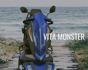 EV Rider Vita Monster Scooter |EV Rider Vita Monster Scooter|EV Rider Vita Monster Scooter adjustable tiller|Vita  Monster all-terrain scooter with comfortable captains' chair supports up to 350 lbs.|Vita Monster with double a-arm front suspension|Blue Sapphire  Vita Monster|EV Rider Vita Monster Scooter|Blue Sapphire  Vita Monster|Optional Electric Horn with 3 sounds|Optional deluxe cup holder|Optional Safety Flag|EV Rider Vita Monster Scooter