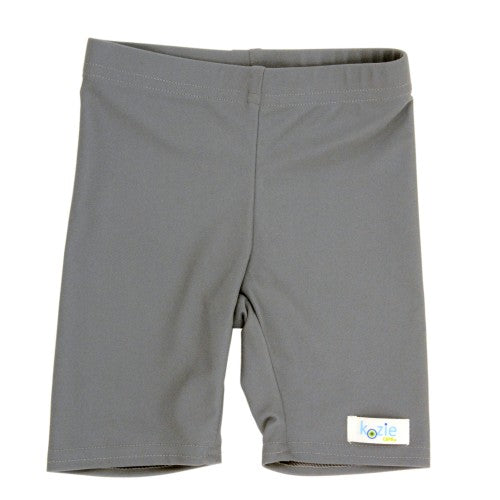 Kozie Clothes Unisex Sensory Compression Shorts|Unisex Sensory Compression Shorts in white|Unisex Sensory Compression Shorts in blush pink|Unisex Sensory Compression Shorts in steel gray|Girl wearing Unisex Sensory Compression Shorts in Gray|Kozie Clothes Compression Shorts Size Chart