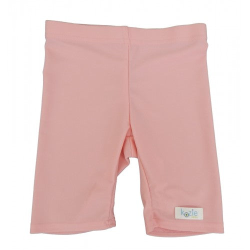 Kozie Clothes Unisex Sensory Compression Shorts|Unisex Sensory Compression Shorts in white|Unisex Sensory Compression Shorts in blush pink|Unisex Sensory Compression Shorts in steel gray|Girl wearing Unisex Sensory Compression Shorts in Gray|Kozie Clothes Compression Shorts Size Chart