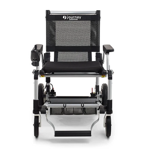 Zoomer - Black|Zoomer - Blue|Quick guide to the Zoomer|Lightweight 52# and easy to drive inside or outside|Joystick comes standard on right but can easily remount on the left by user|Comfort Seating|25 inch turning radius for easy indoor turns|Easy to fold - step 1 pull the cable|Easy to fold - step 2 fold the chair|Easy to fold - step 3 roll away|Slide up to the table or desk with no problem||Easily Scales up to a 10° incline|Fits in nearly any vehicle within seconds
