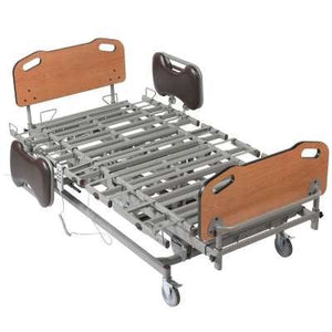 Prime Plus Expandable Hospital Bed Oak head and footboards|Remote with position including head and knee articulation, hi-low and trend and reverse trend.|Optional Bariatric Foam Mattress by Drive Medical shown with bed|Oversized head and footboard in cherry|Oversized head and footboard in oak|Oversized Head and Footboard  Mahogany