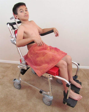 Reclined shower chair with adjustable leg rests