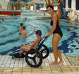 Vipamat Hippocampe Pool Wheelchair Near Pool|Vipamat Hippocampe Pool Wheelchair Front and Side View|Vipamat Hippocampe Pool Wheelchair being used in pool|Vipamat Hippocampe Pool Wheelchair with Child rider|Vipamat Hippocampe Pool Wheelchair with Child rider and assist
