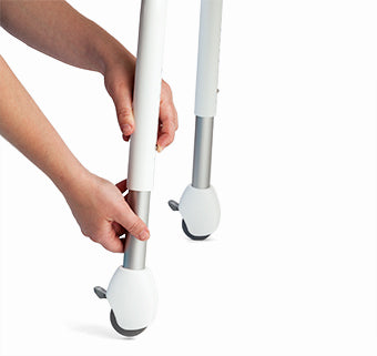 Adjustable leg heights for tubs
