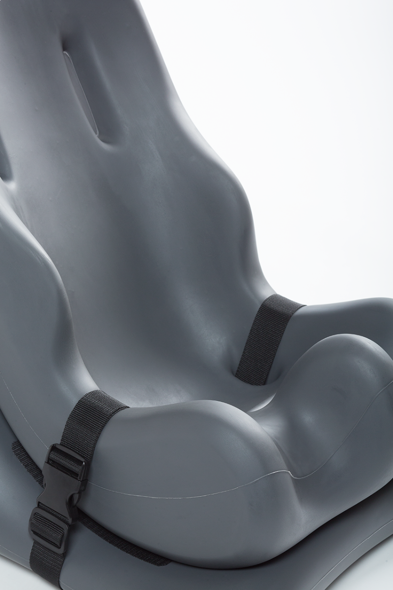 Special Tomato Soft-Touch Floor Sitter with Wedge Base in Aqua|Special Tomato Soft-Touch Floor Sitter with Wedge Base in Lilac|Special Tomato Soft-Touch Floor Sitter with Wedge Base in Dark Gray|Attachment Straps come standard on chest and pelvic area|Closeup of connection and leg area|Optional Special Tomato Mobile Activity Tray in Aqua|Optional Special Tomato Mobile Activity Tray in Gray, Chocolate and Lilac