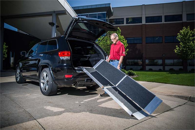 TRIFOLD RAMP Advantage Series Main|TRIFOLD RAMP Advantage Series Angle 1|TRIFOLD RAMP Advantage Series Angle 2|TRIFOLD RAMP Advantage Series Closeup|TRIFOLD RAMP Advantage Series Collapse 1|TRIFOLD RAMP Advantage Series Collapse 2|TRIFOLD RAMP Advantage Series Collapse 3|TRIFOLD RAMP Advantage Series Collapsed|Optional Top Lip Extension adding 6" to clear bumpers of SUV and vans made for wheelchairs and scooters.