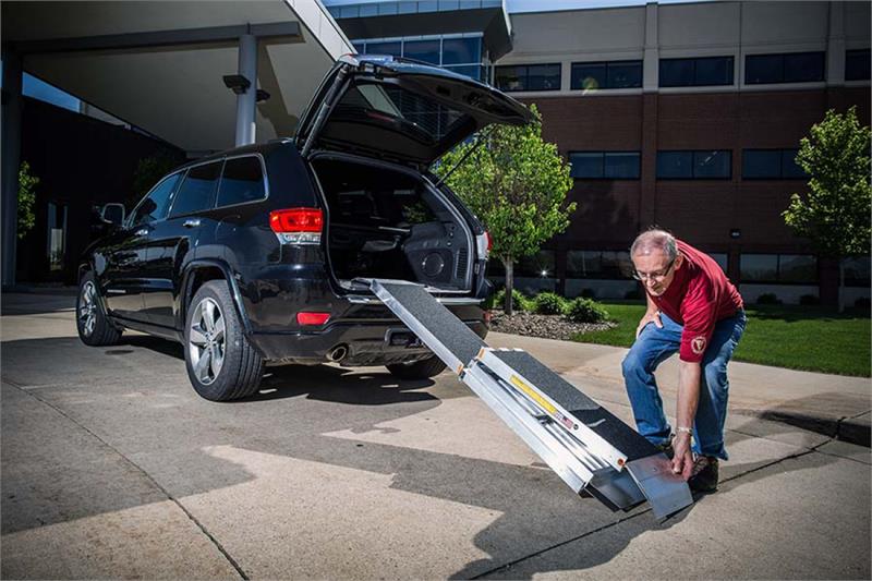 TRIFOLD RAMP Advantage Series Main|TRIFOLD RAMP Advantage Series Angle 1|TRIFOLD RAMP Advantage Series Angle 2|TRIFOLD RAMP Advantage Series Closeup|TRIFOLD RAMP Advantage Series Collapse 1|TRIFOLD RAMP Advantage Series Collapse 2|TRIFOLD RAMP Advantage Series Collapse 3|TRIFOLD RAMP Advantage Series Collapsed|Optional Top Lip Extension adding 6" to clear bumpers of SUV and vans made for wheelchairs and scooters.